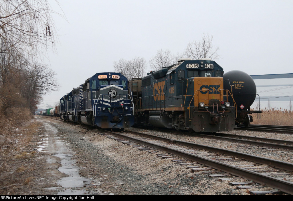 CSX 4316 waits for its return to CSX property as LSRC's power for Z127 rests for New Years Day